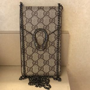 Crossbody bag. New- holds 3 credit cards, cash, lipstick and phone.